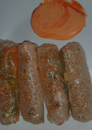 A picture of Crispy summer rolls with siracha mayo.