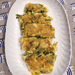 A picture of Pan Fry Eggs with Green Chives.