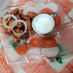A picture of Orange chicken tikka boti.