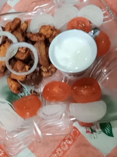 A picture of Orange chicken tikka boti.