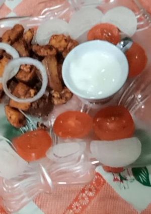 A picture of Orange chicken tikka boti.