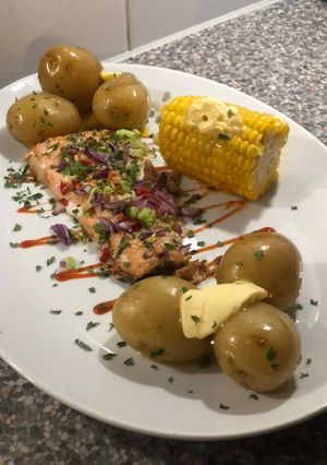 A picture of Light Chilli Salmon With Baby Potatoes.