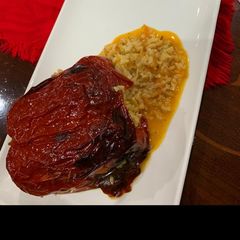 A picture of Peppers with rice and minced meat.
