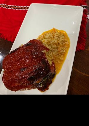 A picture of Peppers with rice and minced meat.