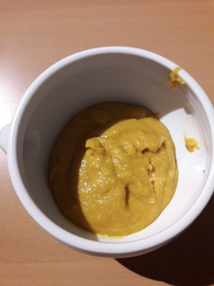 Une photo de Velouté de carottes et patates douces au lait de coco et curry