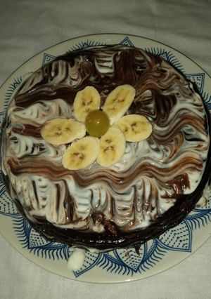 صورة لوصفة كيكة الفانيلا في طنجرة الضغط بصوص الشوكولا 😋