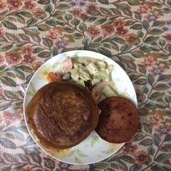 A picture of Chicken salami burger.