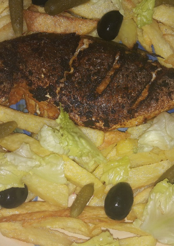 صورة لوصفة سمكة مشوية في المقلاة 😋😋