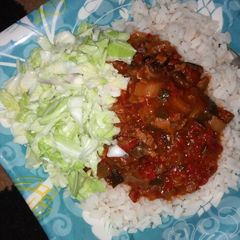 A picture of Rice nd stew with coslow.