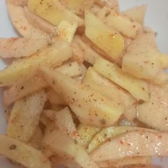 A picture of Raw mango pickle.