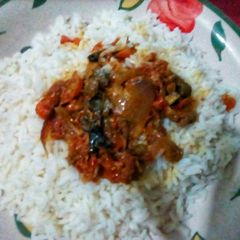 White rice and Fish Gravy A picture of White rice and Fish Gravy.
