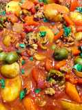 Pork ragout with paprika and green olives
