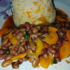Carrot rice with beans stew A picture of Carrot rice with beans stew.