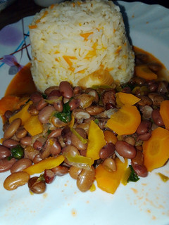 A picture of Carrot rice with beans stew.
