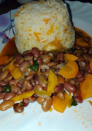A picture of Carrot rice with beans stew.
