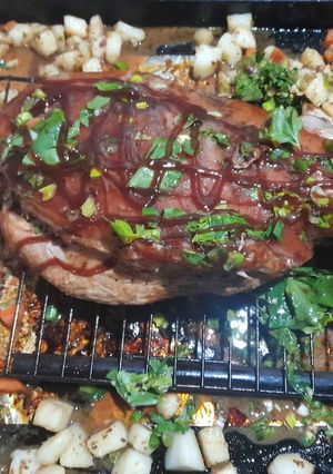 A picture of Oven-Roasted Pork Shoulder with Potatoes.