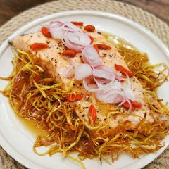 A picture of Steamed Salmon with Ginger Floss.