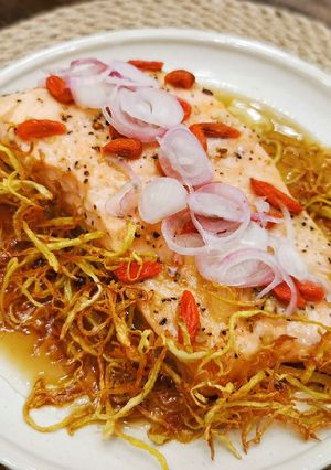 A picture of Steamed Salmon with Ginger Floss.