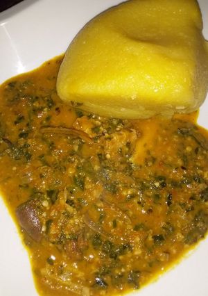 A picture of Eba wit ugu and waterleaf soup.
