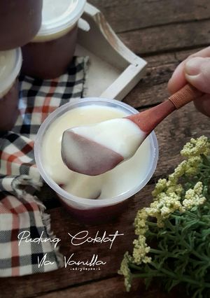 A picture of Chocolate Pudding with Vanilla Sauce.