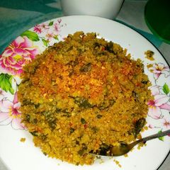 A picture of Steam Rice and moringa leaves.