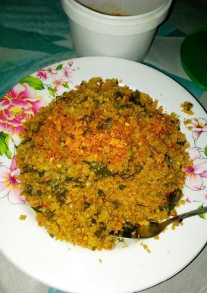 A picture of Steam Rice and moringa leaves.
