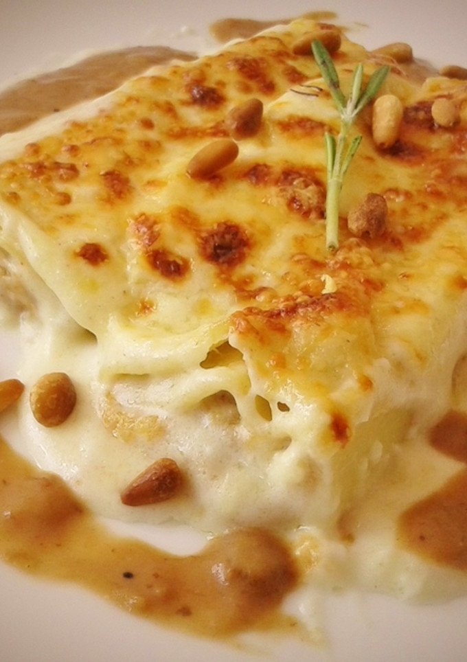 Una foto de Canelones rellenos de pollo rustido