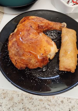A picture of Chicken leg with plum sauce & spring roll. Airfyer.
