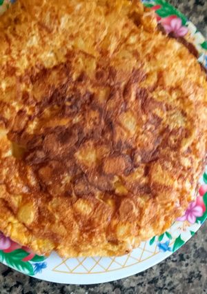 Una foto de Tortilla de Papa, Cebolla y Ajo