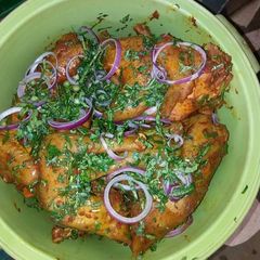 A picture of Fried chicken with utazi leaves.