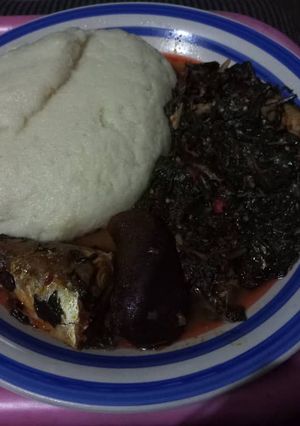 A picture of Vegetable soup with fufu.