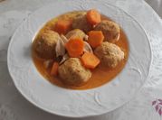 Una foto de filetes con tocino