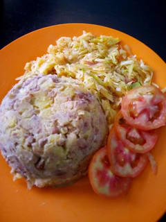 A picture of Kimanga served with cabbage.