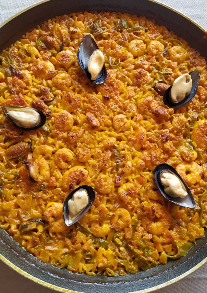 Una foto de Arroz al horno con marisco