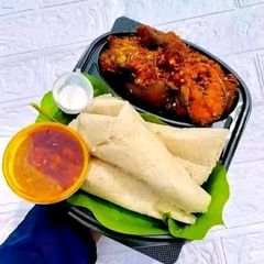 A picture of Ekuru (White Moi Moi) & Ata Dindin(Pepper Sauce).