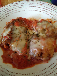 Una foto de Bacalao con tomate y queso