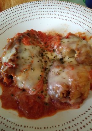 Una foto de Bacalao con tomate y queso