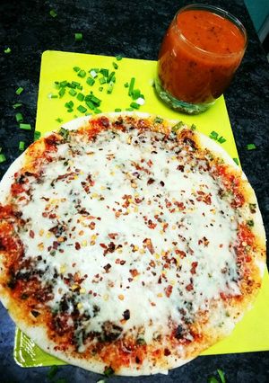 A picture of Cheese Uttapam pizza style.