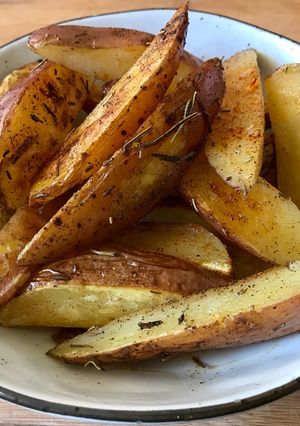 Una foto de Papas doradas al romero y pimentón