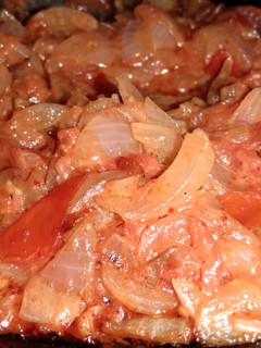 A picture of Tomato onion veg.