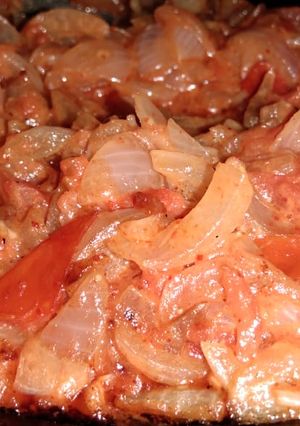 A picture of Tomato onion veg.