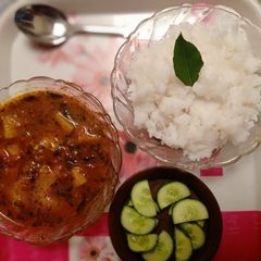 A picture of (methi aloo) fenugreek leaves with potato in tomato gravy).
