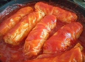 Una foto de Niños envueltos de pollo