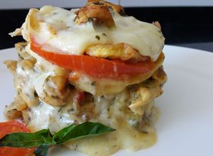 Una foto de Terrina de pollo, huevo, crema, queso y tomate