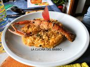 Una foto di risotto scampi