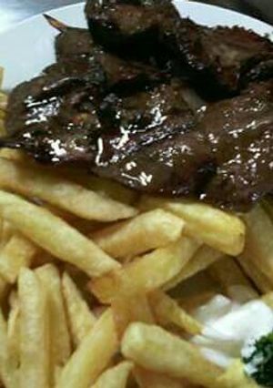 Una foto de Anticuchos