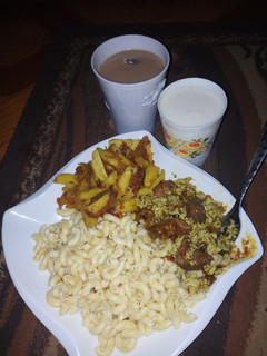 A picture of White macaroni and egg sauce.