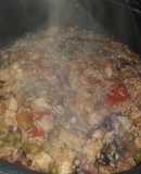 Arroz rojo con pollo y mariscos