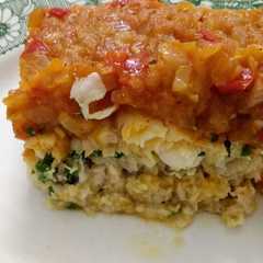 Una foto de Filete de merluza al horno, con ensalada