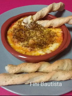 Una foto de Queso provolone al horno